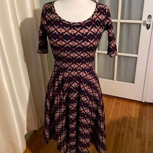 LuLaRoe Nicole Dress. Fit & Flare Style. Size XS. Navy, red and tan colors.